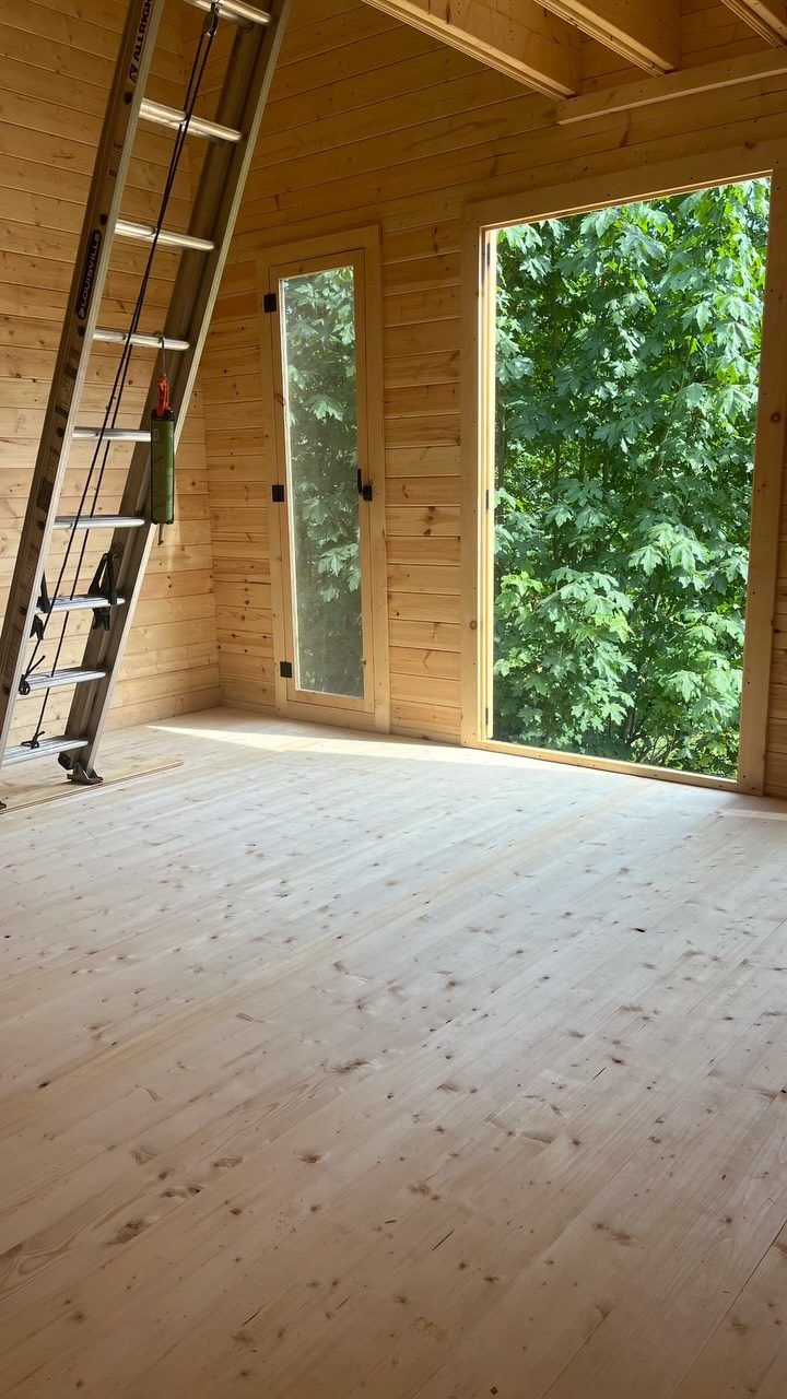Finished cabin interior with wood finishes
