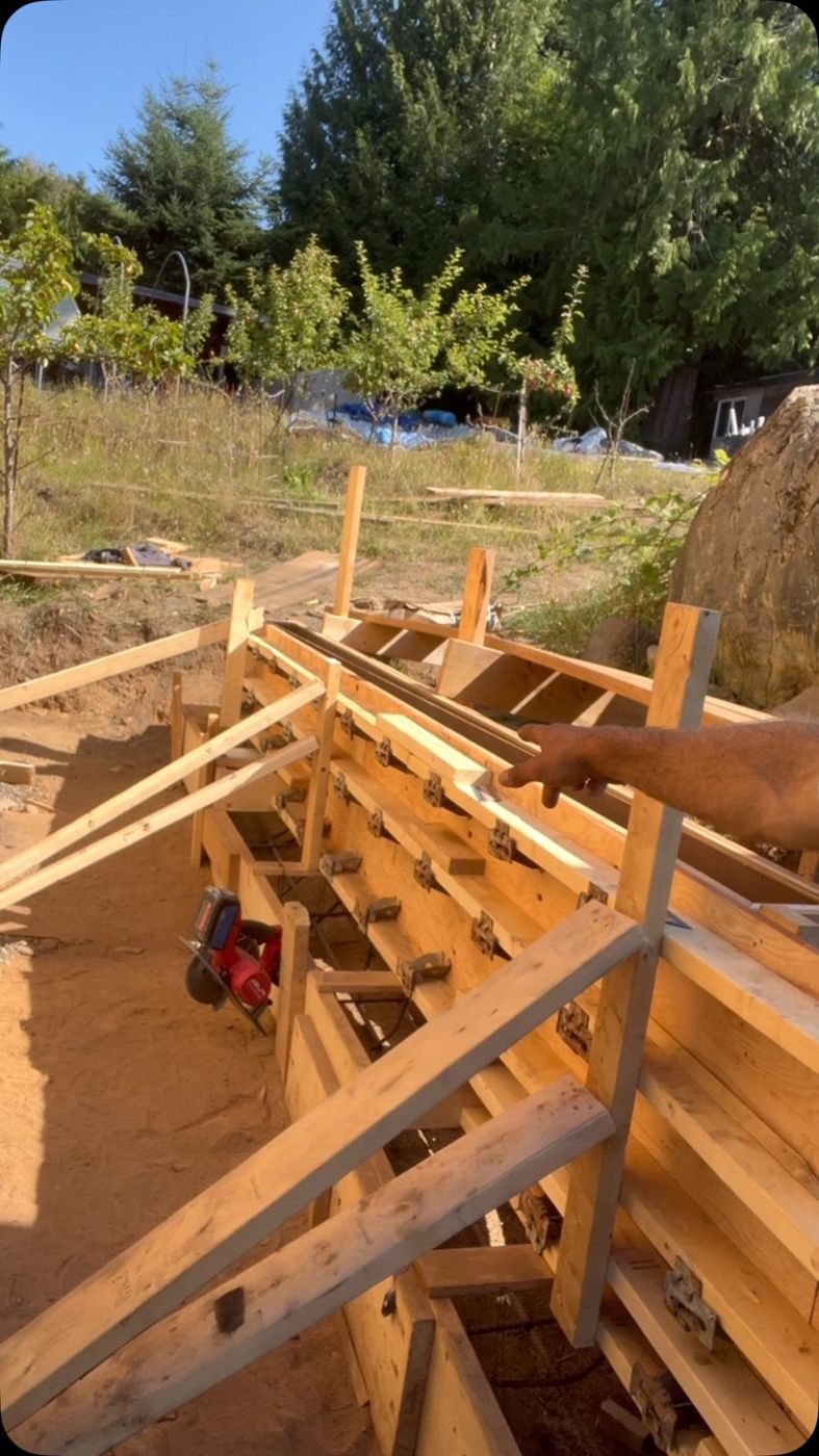 Wooden footing and stair forms ready for concrete